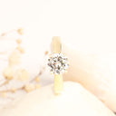 Tapered Shoulder Solitaire White Diamond Ring in Yellow Gold