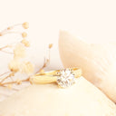 Tapered Shoulder Solitaire White Diamond Ring in Yellow Gold