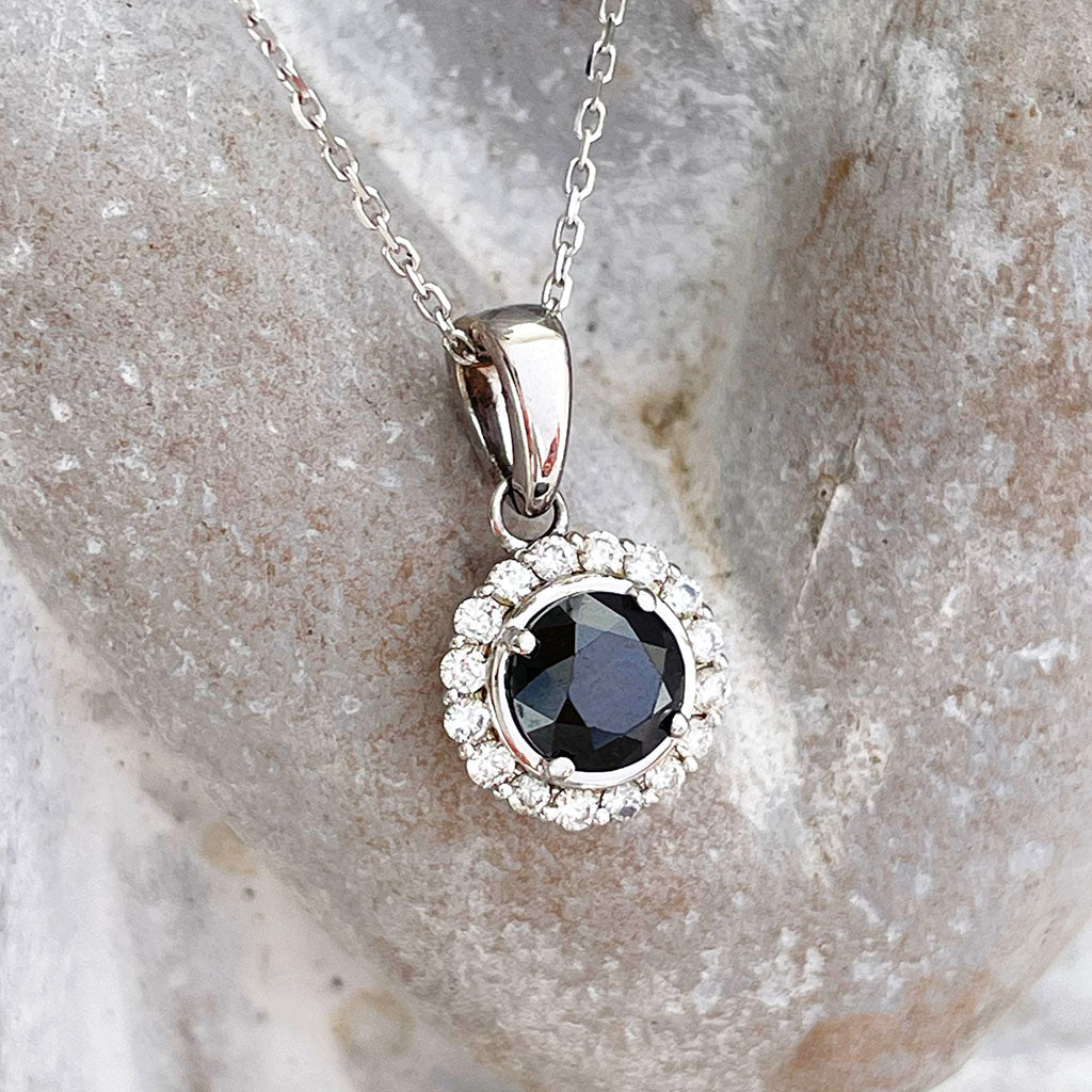 Black Diamond with white diamond halo pendant