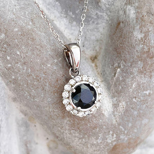 Black Diamond with white diamond halo pendant