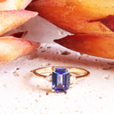 Timeless Emerald Cut Tanzanite and Petite Diamond Accent Yellow Gold Ring