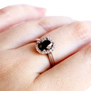Timeless Oval Black Diamond With White Halo White Gold Ring