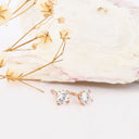 white diamond rose gold studs