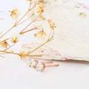 white diamond rose gold studs