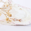 white diamond rose gold studs