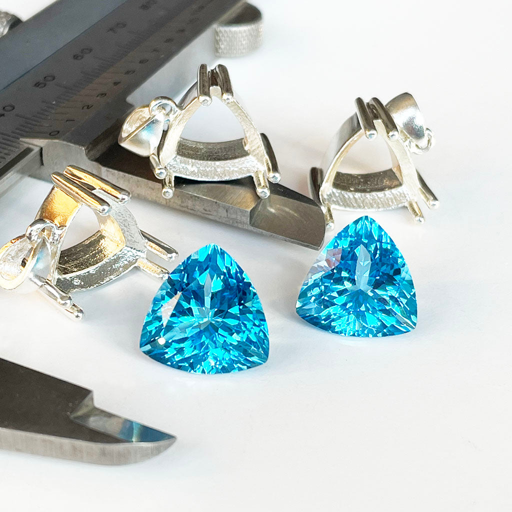 Topaz - Blue Trilliant Cut Pair - 21.69ct