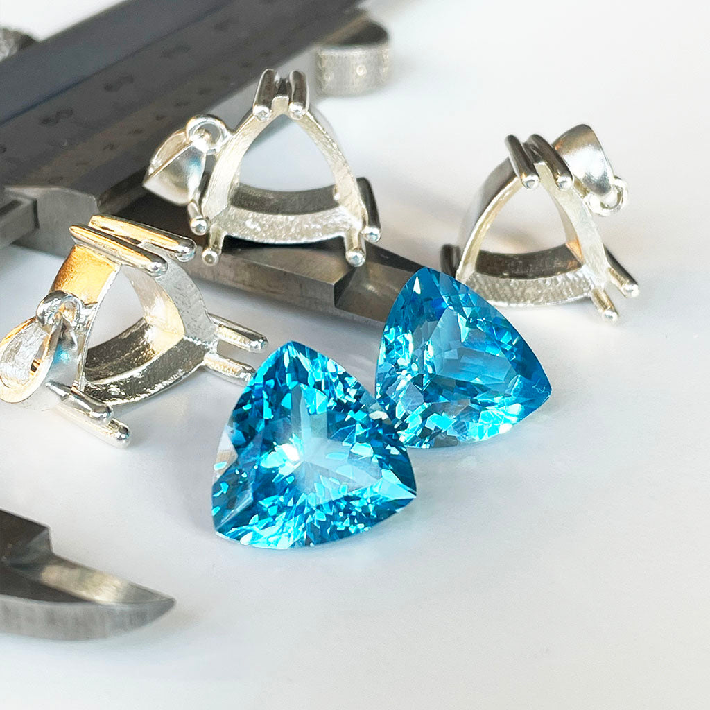 Topaz - Blue Trilliant Cut Pair - 21.69ct