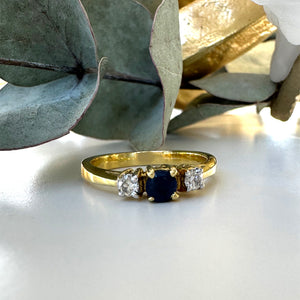 Trilogy Center Sapphire Ring with White Diamond Accents