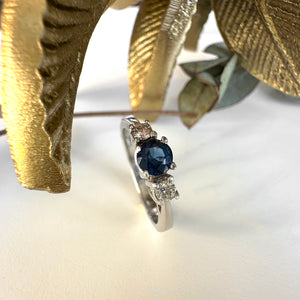 Trilogy Center Sapphire Ring with White Diamond Accents in White Gold