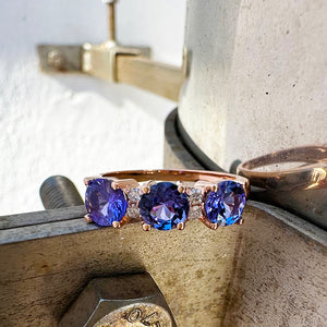 Trilogy Tanzanite Ring with Double Diamond Highlights in Rose Gold