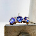 Trilogy Tanzanite Ring with Double Diamond Highlights in Rose Gold