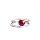 Tube Set Solitaire Ruby Set in a White Gold Split Shank Ring