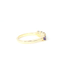 Elegantly Looped Gallery Tanzanite and Tsavorite Yellow Gold Ring