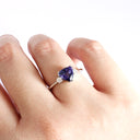 White Gold Double Claw Trilliant Cut Tanzanite With Diamond Shoulder Highlight Ring