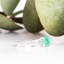 White Gold Emerald Split Shank Accent Diamond Ring