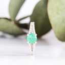 White Gold Emerald Split Shank Accent Diamond Ring