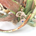 Africa Map Cut Out Paw Prints with Tanzanite in Rose Gold