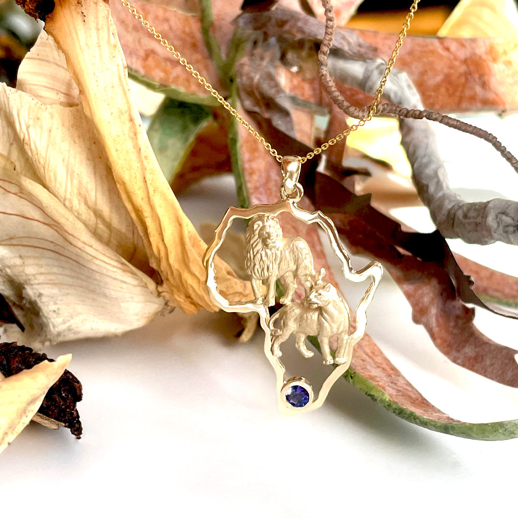 African Lion Couple with Tanzanite Accent Yellow Gold Pendant