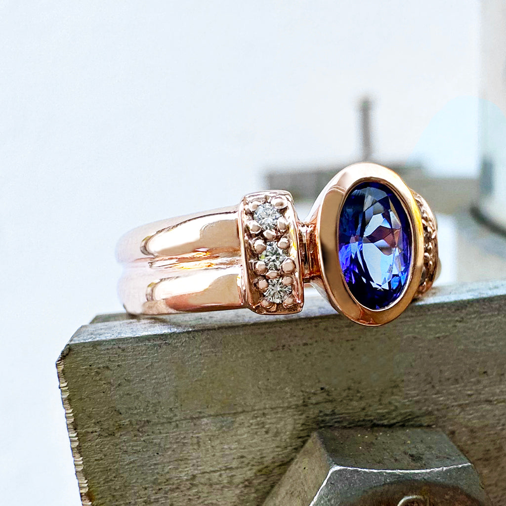 Double Band Oval Tanzanite Ring with Elaborate Diamond Shoulders in Rose Gold