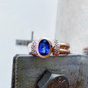 Double Band Oval Tanzanite Ring with Elaborate Diamond Shoulders in Rose Gold