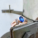 Double Band Oval Tanzanite Ring with Elaborate Diamond Shoulders in Rose Gold