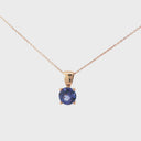 Four Claw Round Cut Tanzanite Rose Gold Pendant