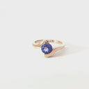 Molten Hot Round Cut Rose Gold Tanzanite Ring