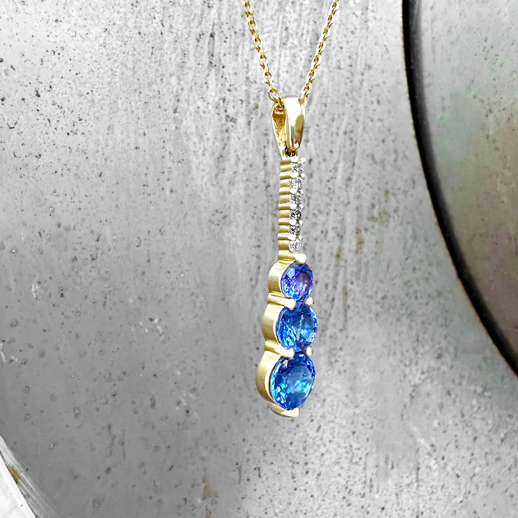 Tanzanite and Six Diamond Drop Yellow Gold Pendant