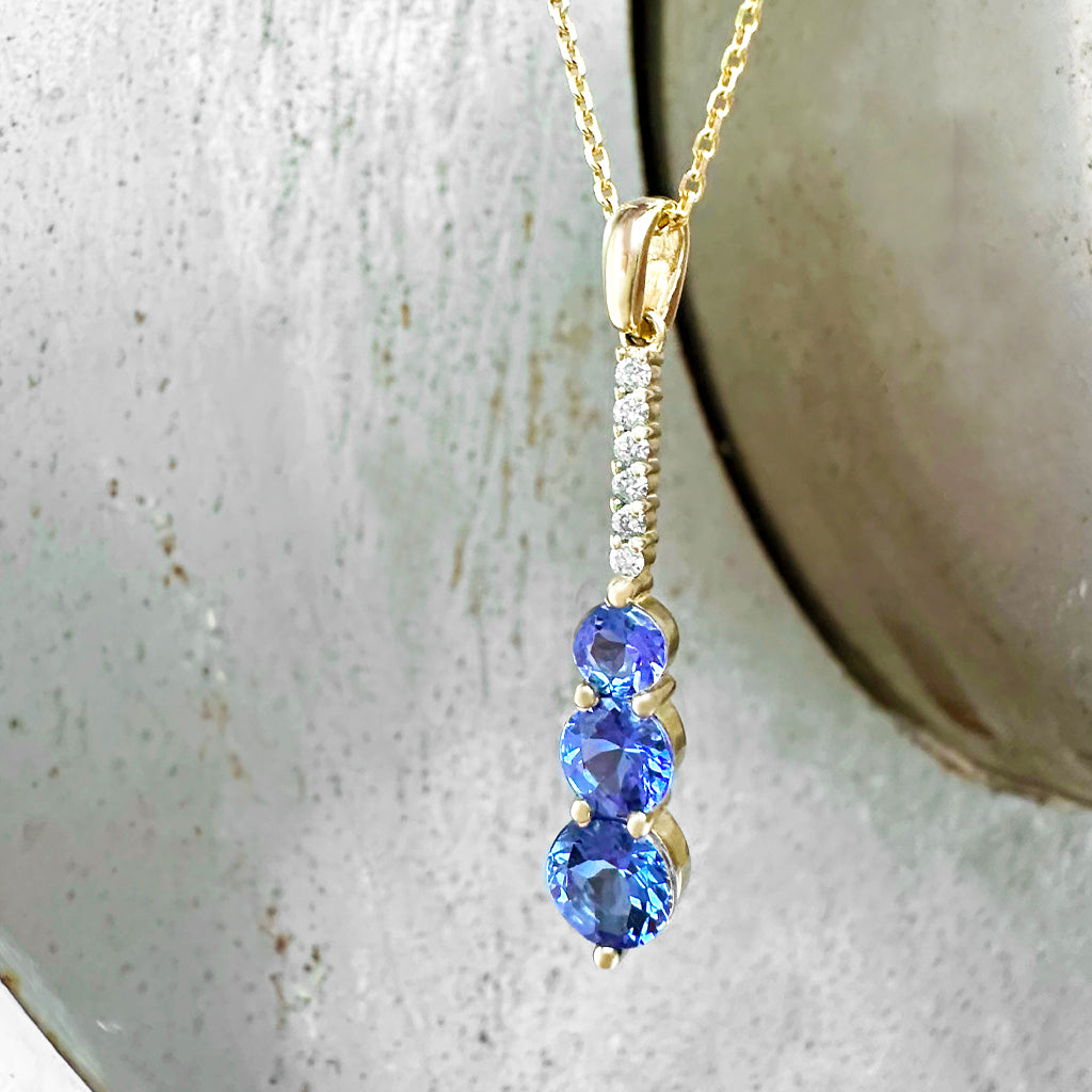 Tanzanite and Six Diamond Drop Yellow Gold Pendant