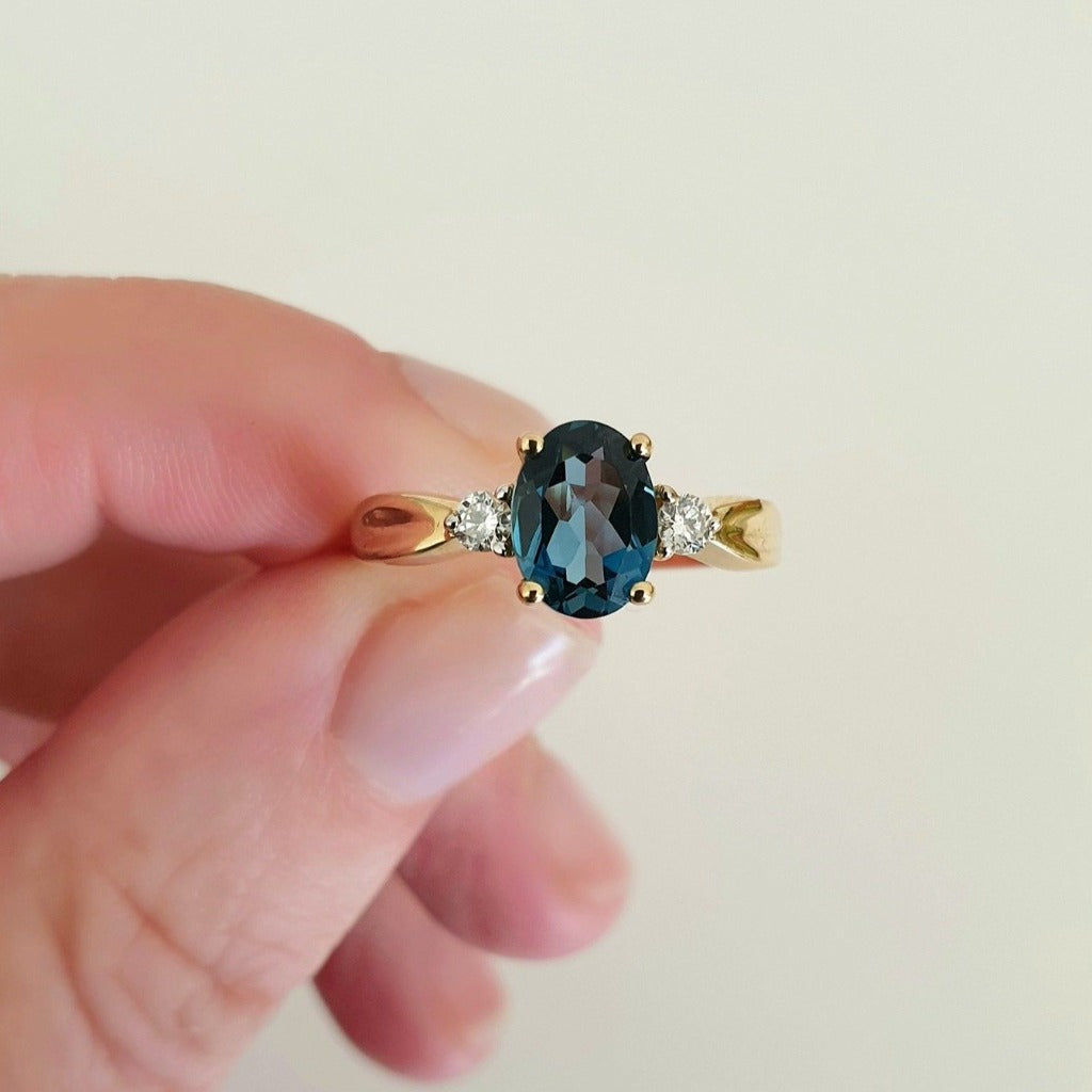 Oval-Cut London Blue Topaz Ring with Diamond Accents