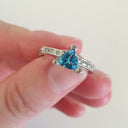 Trilliant Cut Blue Topaz With Diamond Point Accent