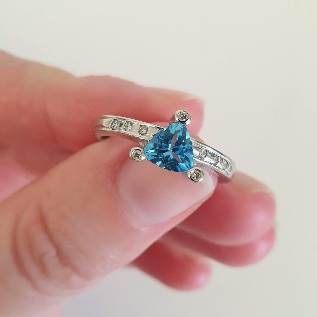 Trilliant Cut Blue Topaz With Diamond Point Accent