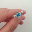 Trilliant Cut Blue Topaz With Diamond Point Accent
