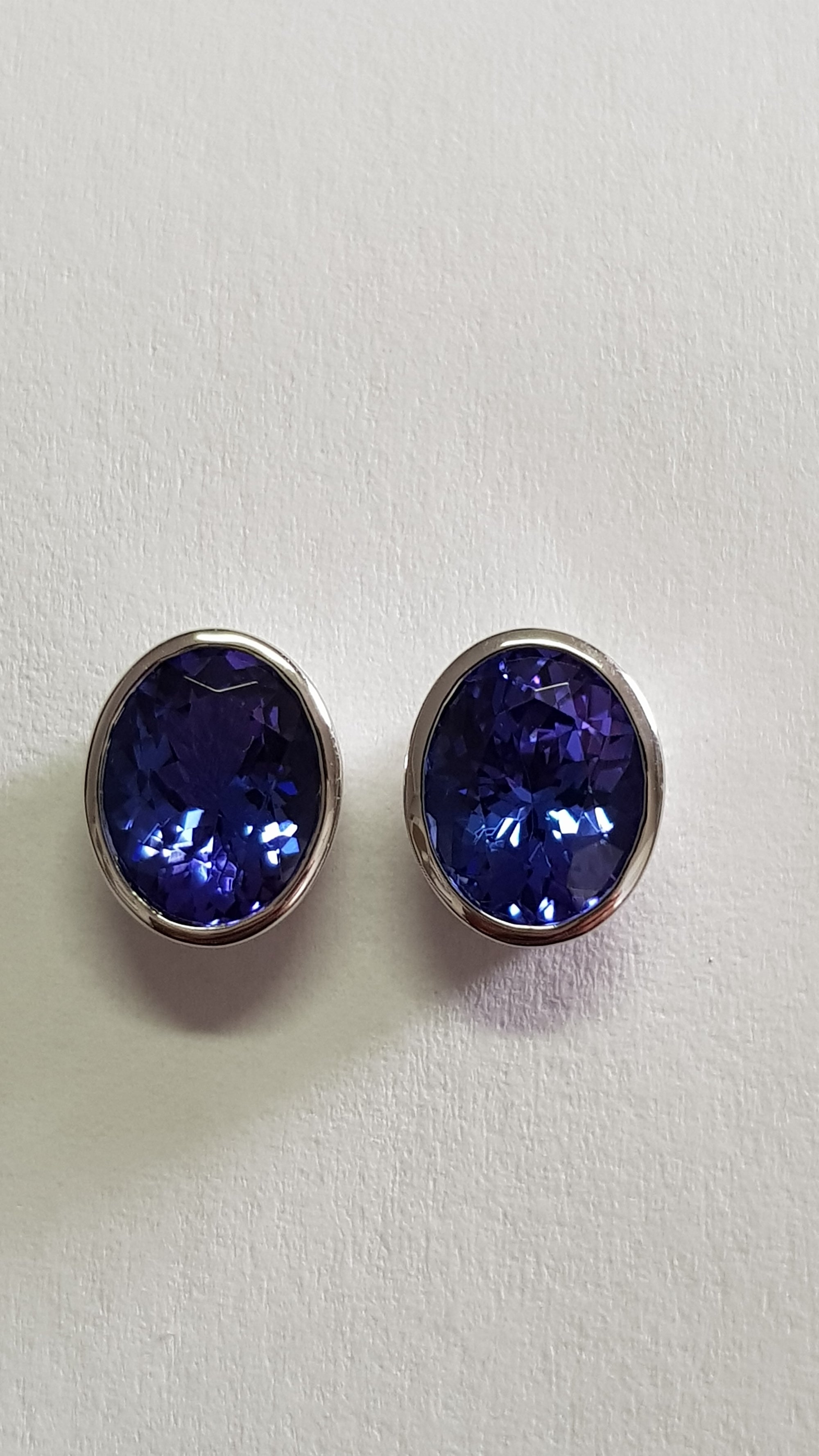 Sophisticated Bezel Set Oval Cut Tanzanite Earrings