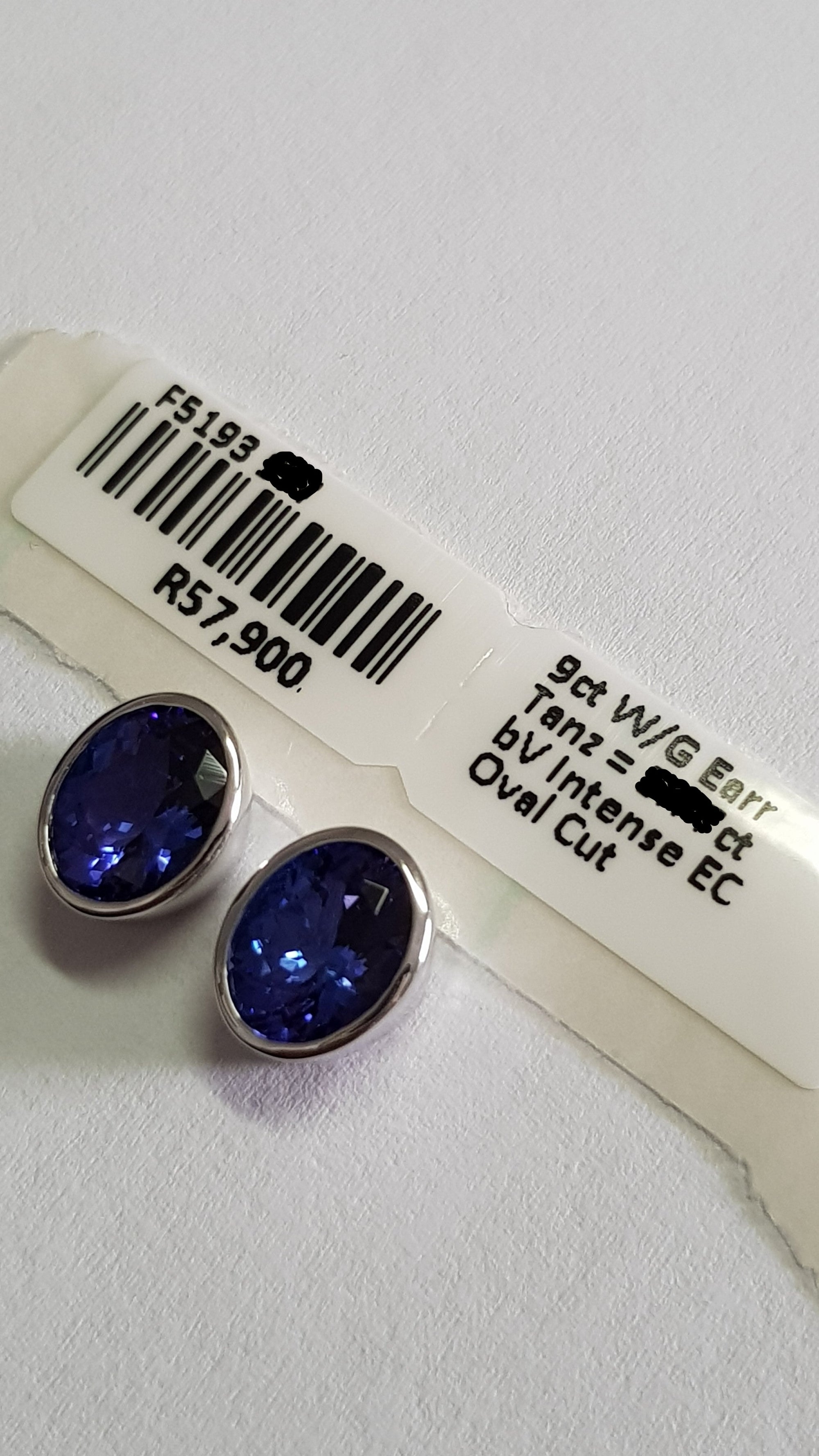 Sophisticated Bezel Set Oval Cut Tanzanite Earrings