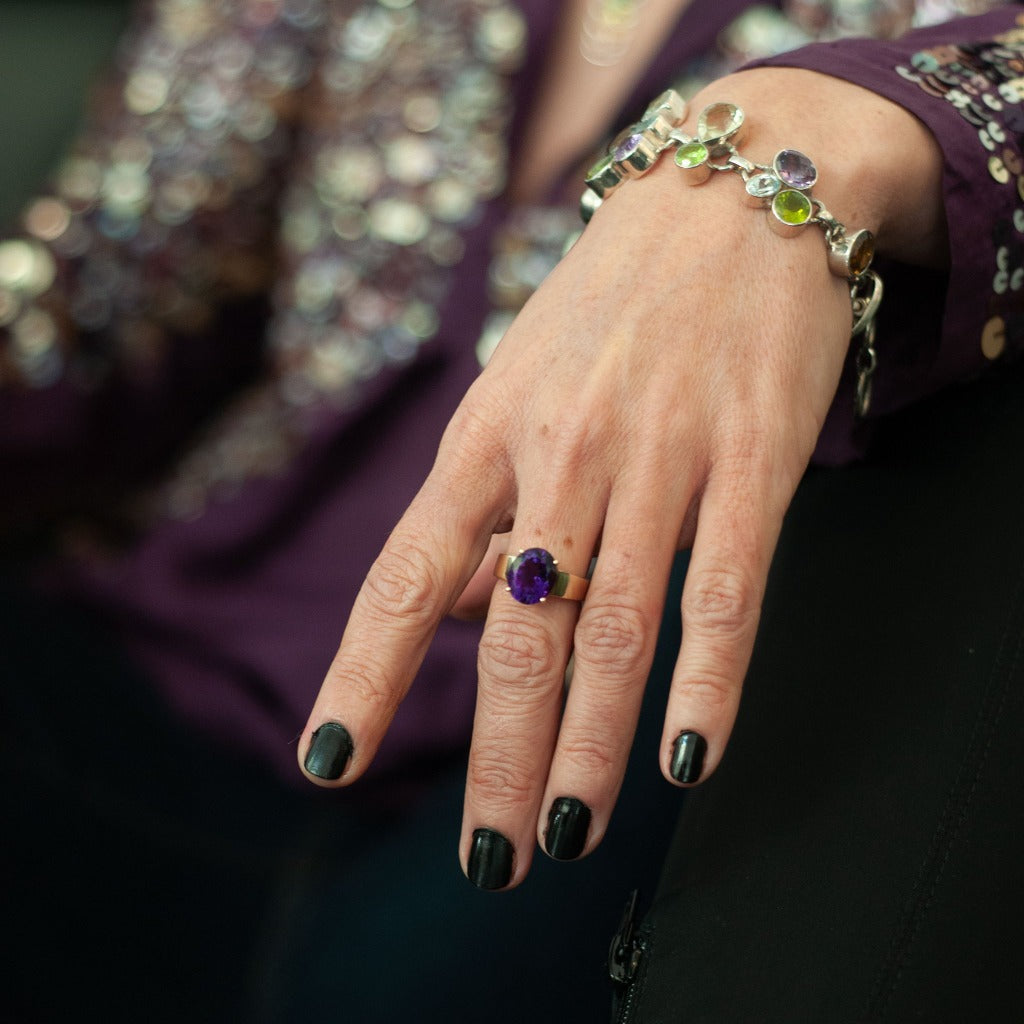 Oval Cut Amethyst and Yellow Gold Ring
