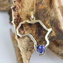 Africa Outline Yellow Gold Trilliant 0.41ct Tanzanite Pendant