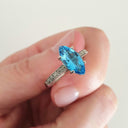 Marquise Cut Blue Topaz White Gold Ring with Diamond Accented Band