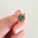 Rose Gold London Blue Topaz Ring with Diamond Halo and Band Accents