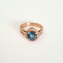 Rose Gold London Blue Topaz Ring with Diamond Halo and Band Accents