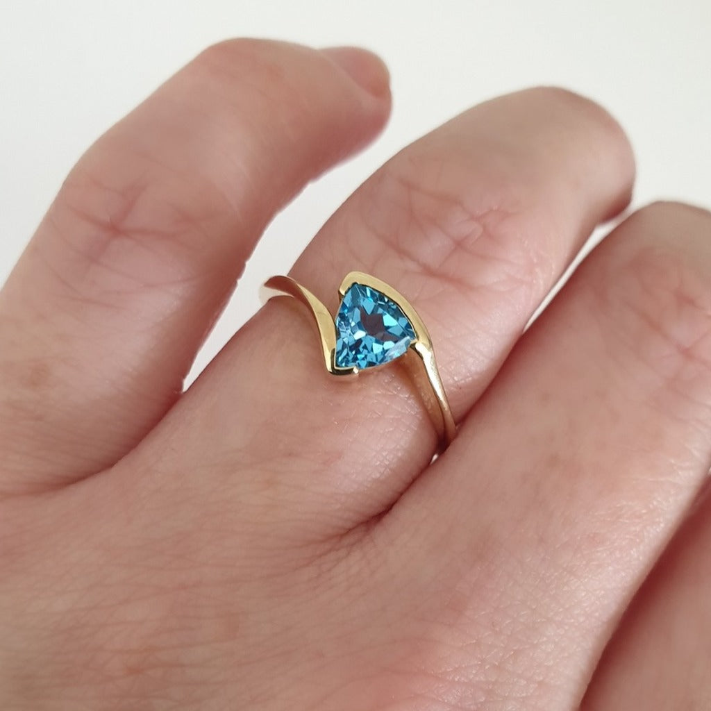 Trilliant Cut Blue Topaz and Yellow Gold Ring