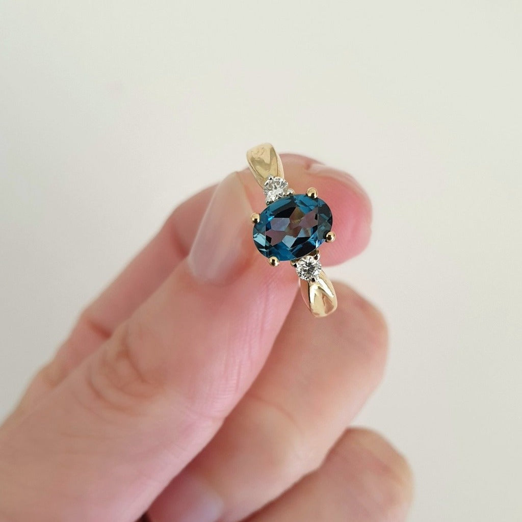 Oval-Cut London Blue Topaz Ring with Diamond Accents 