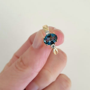 Oval-Cut London Blue Topaz Ring with Diamond Accents 