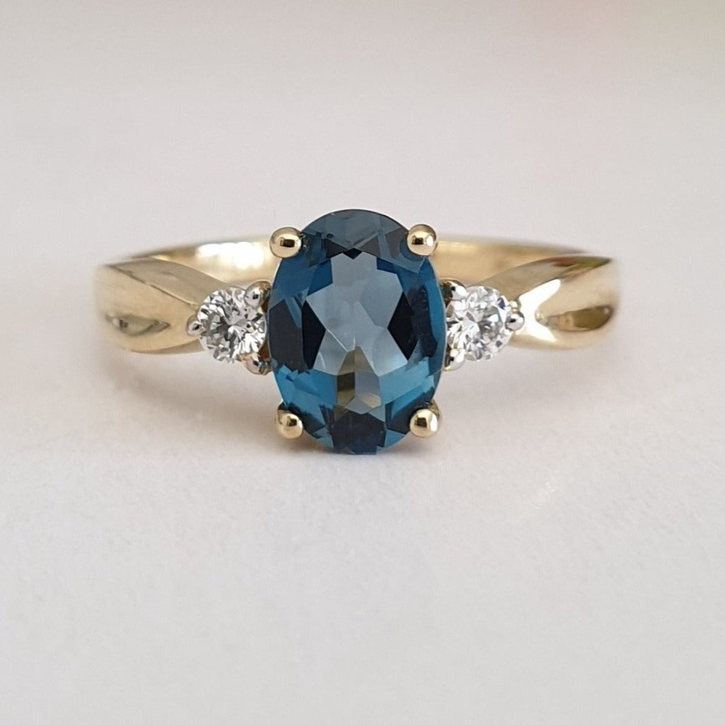 Oval-Cut London Blue Topaz Ring with Diamond Accents 