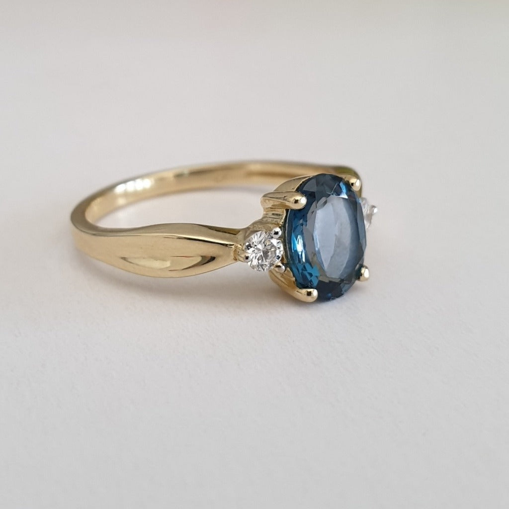 Oval-Cut London Blue Topaz Ring with Diamond Accents 