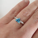 Trilliant Cut Blue Topaz With Diamond Point Accent