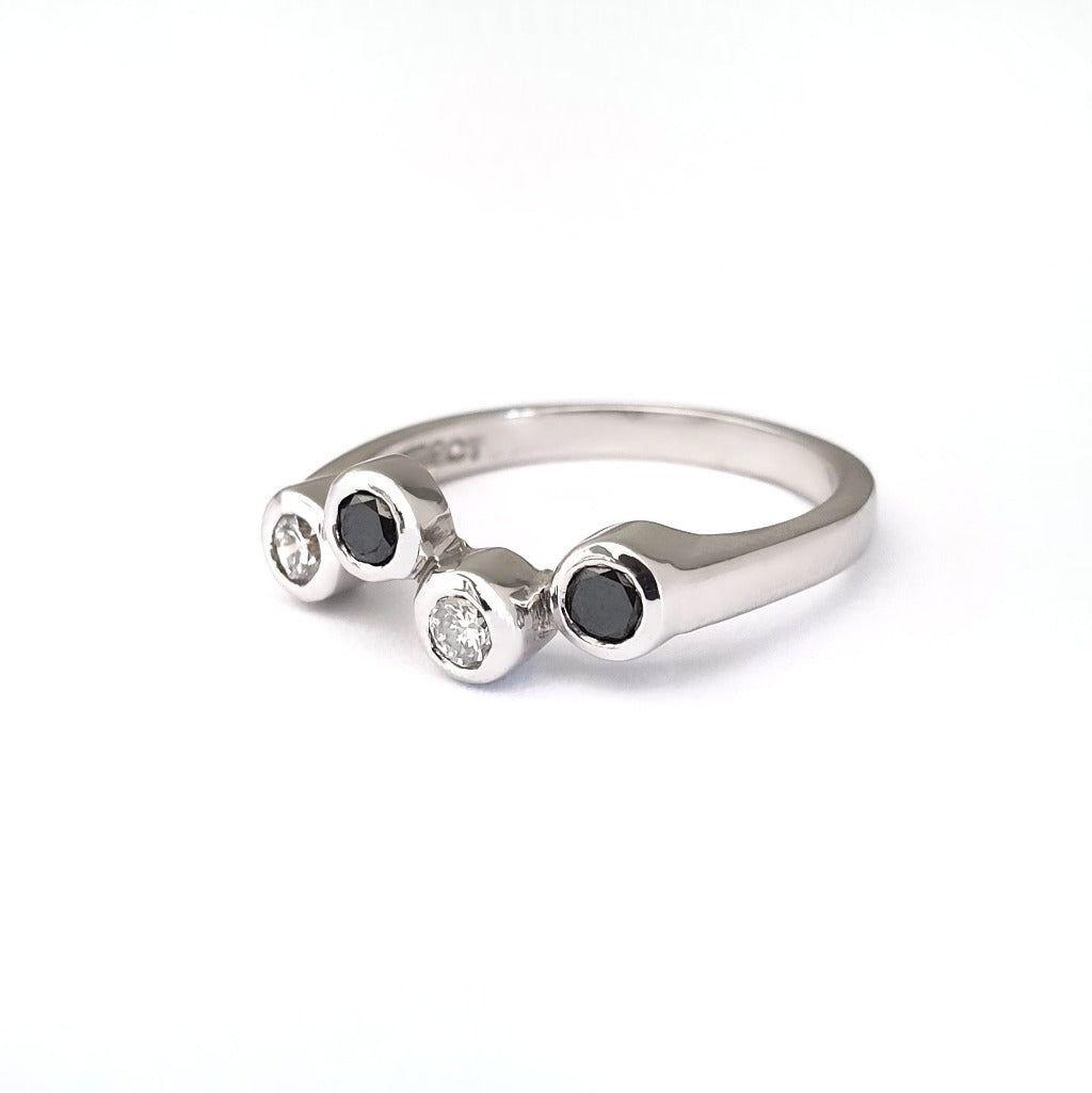 Alternating Black and White Tube Set Diamond Ring