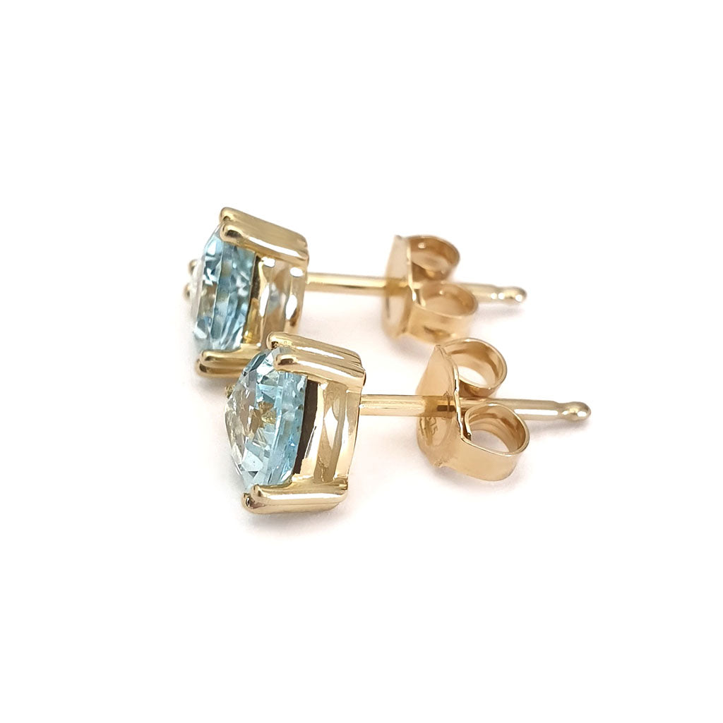 Aquamarine Double Claw Yellow Gold Trilliant Cut Studs