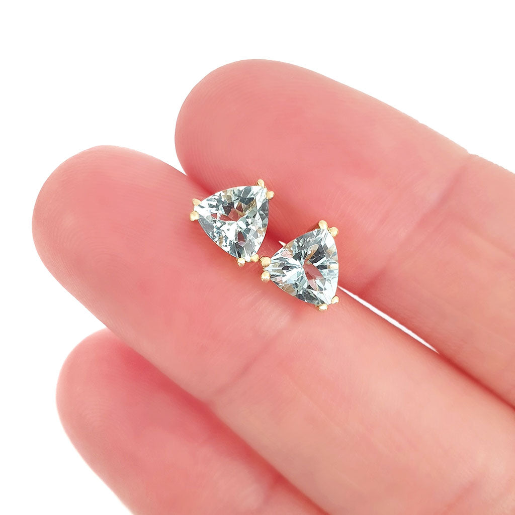 Aquamarine Double Claw Yellow Gold Trilliant Cut Studs