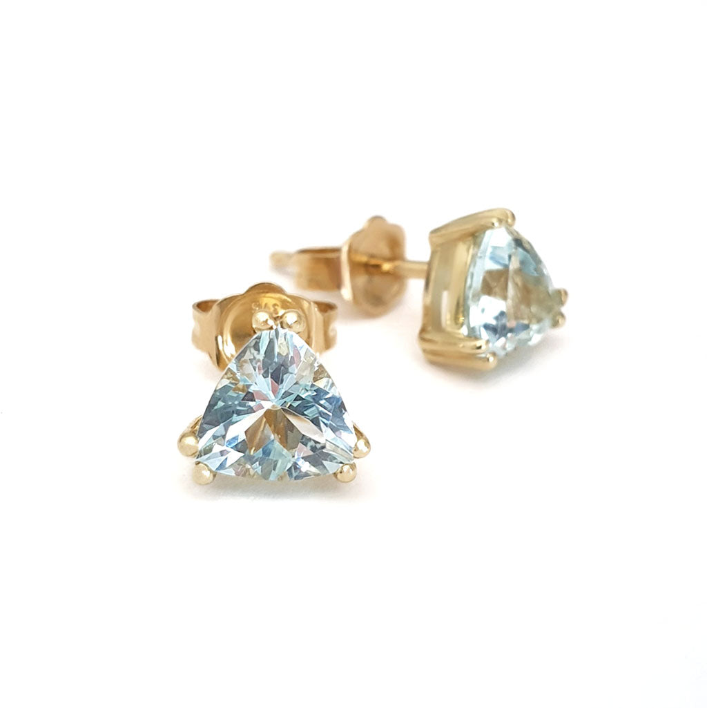 Aquamarine Double Claw Yellow Gold Trilliant Cut Studs